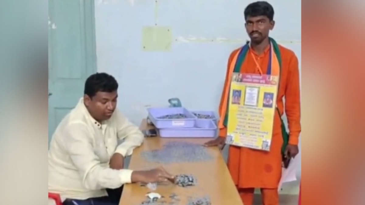 in-karnataka-a-candidate-fills-the-nomination-form-with-10-thousand-coins-of-1-rupee-each-officials-sweat-while-counting-118643