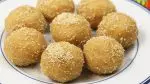 Churma Ladoo: મોઢામાં મૂકતાં જ ઓગળી જાય તેવા દાણાદાર ચુરમાના લાડુ બનાવવાની સિક્રેટ રીત