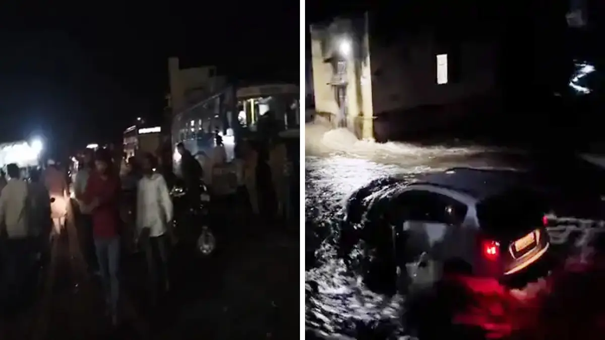 bhavnagar-rain-bhavnagar-rajkot-highway-jammed-as-gotameshwar-lake-in-sehore-overflows-cars-stranded-586705