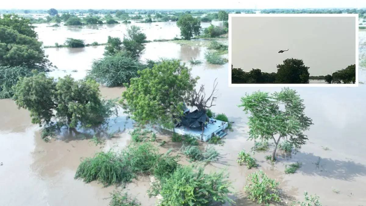 kheda-three-people-trapped-in-the-sabarmati-river-were-rescued-the-district-administration-airlifted-them-592326