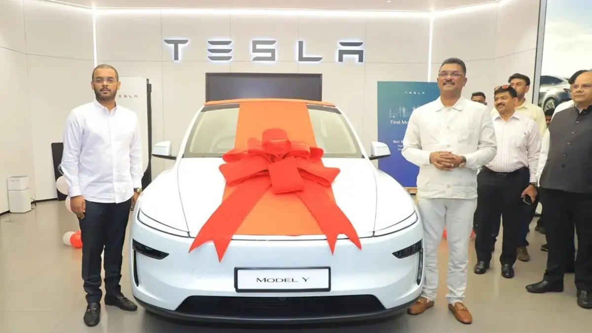 tesla-india-first-delivery-in-india-as-model-y-car-maharashtra-transport-minister-pratap-sarnaik-became-the-first-customer-598176