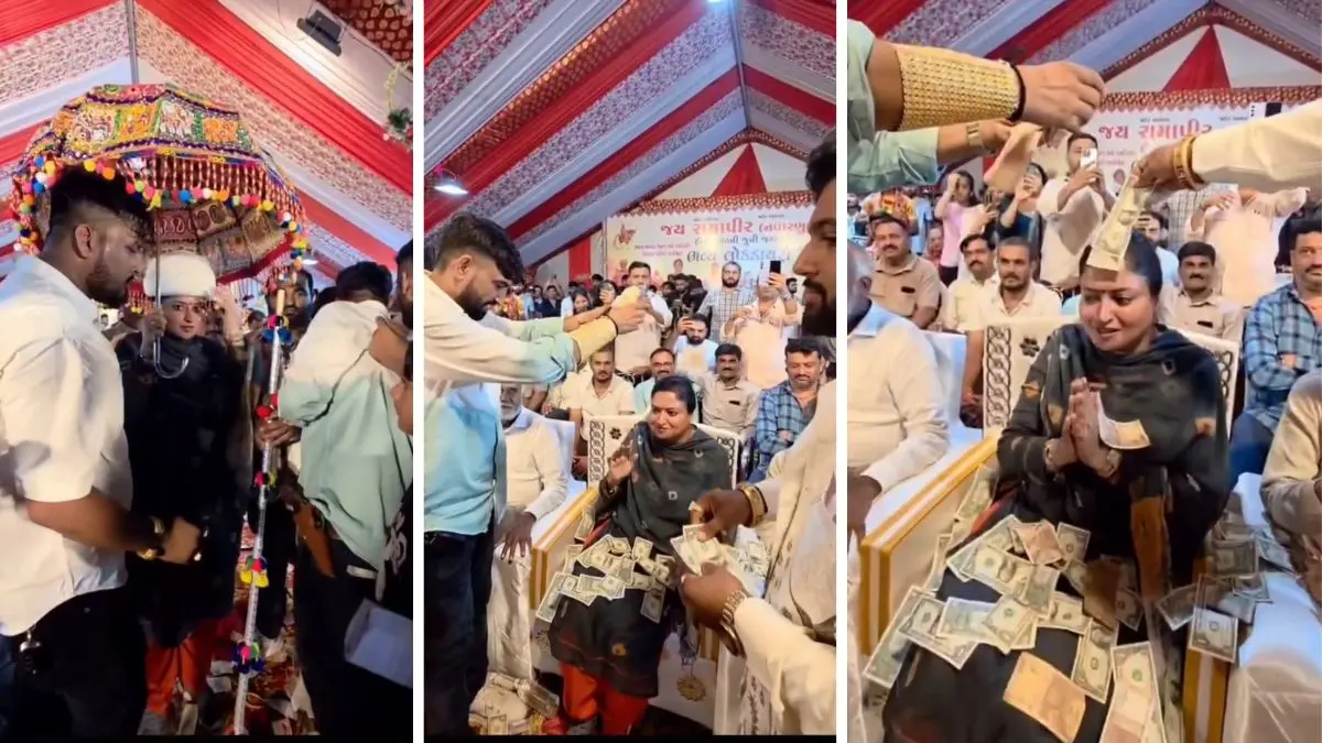 jamnagar-news-bjp-mp-poonamben-maadam-showered-with-dollars-at-ranuja-fair-in-kalavad-596642
