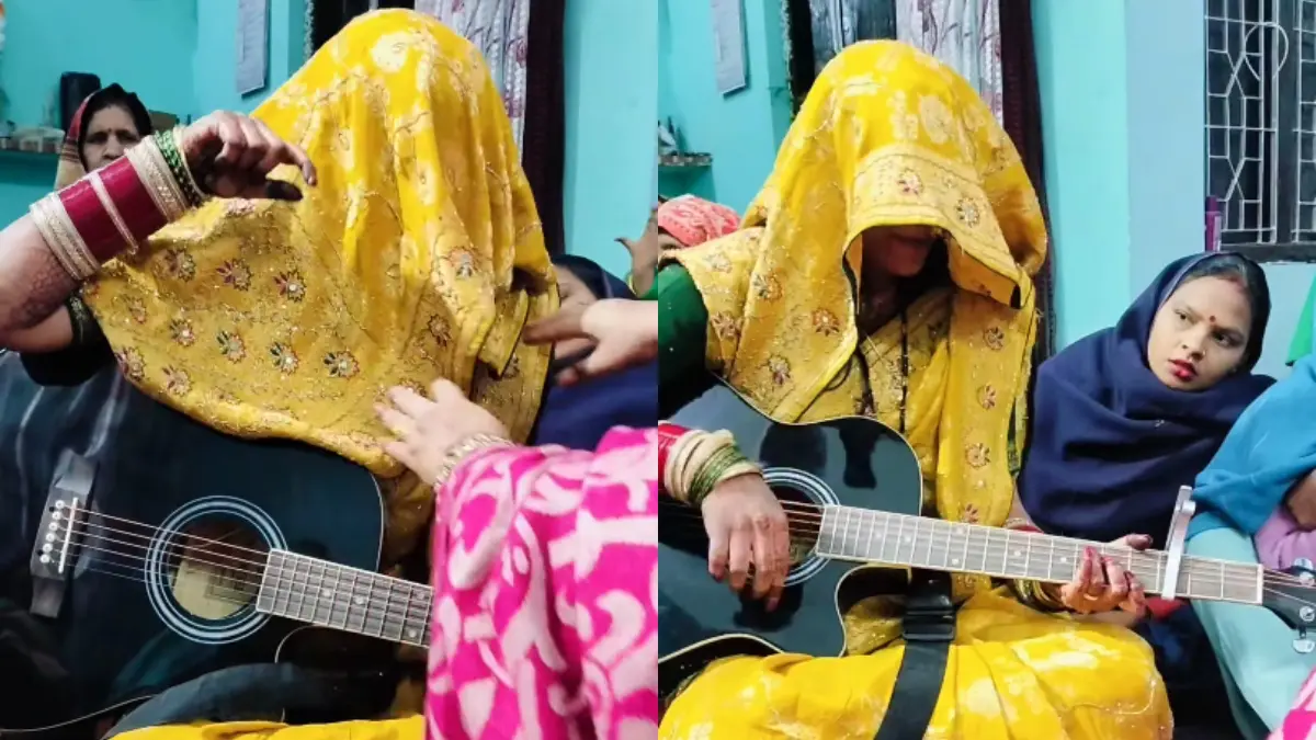 ઘુંઘટ ઓઢેલી નવોઢા બની રૉકસ્ટાર, હાથમાં ગિટાર પકડી ગાયું 'તેરા મેરા પ્યાર અમર', VIRAL VIDEO જોઈ યુઝર્સ બોલ્યા- 'વહુ તો ટેલેન્ટ ક્વિન લાવ્યા'