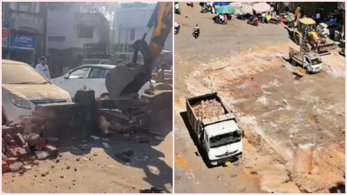 surat-demolition-municipal-corporation-bulldozer-rolls-over-60-feet-long-wall-near-former-mla-arvind-rana-office-652699