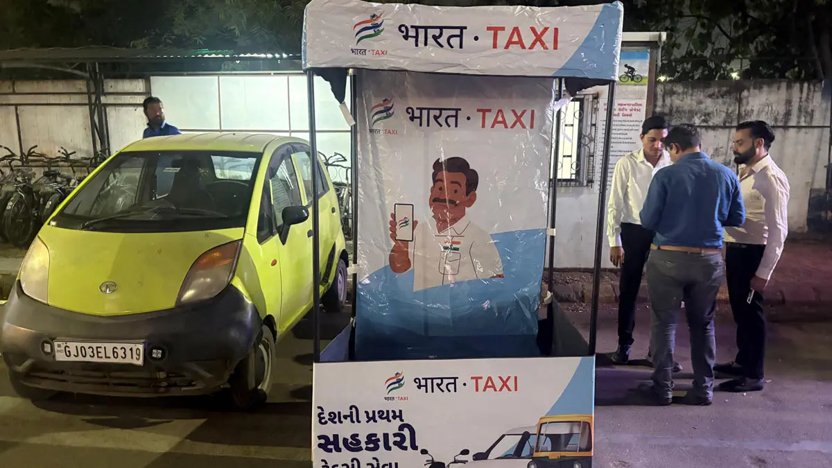 દિલ્હી બાદ હવે રાજકોટમાં 'ભારત ટેક્સી'ની એન્ટ્રી:  કિસાનપરા ચોક ખાતે બૂથ કાર્યરત; માત્ર રાજકોટ જ નહીં, સમગ્ર સૌરાષ્ટ્રને થશે લાભ