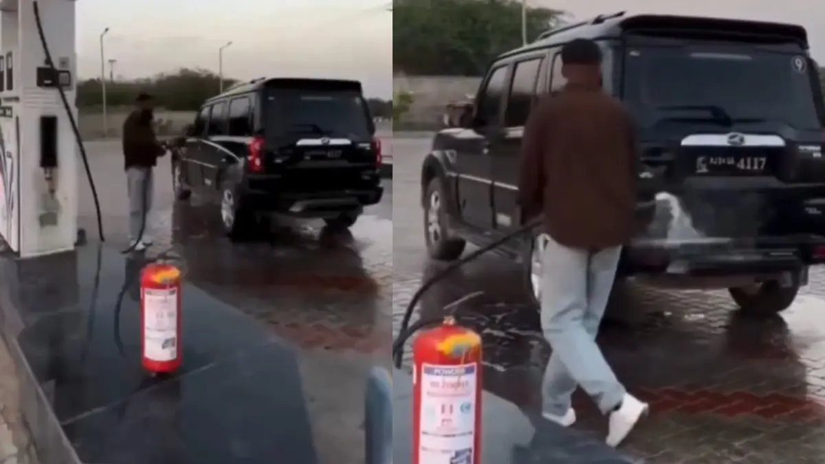 shocking-viral-video-man-washes-scorpio-with-diesel-at-petrol-pump-arrested-721676