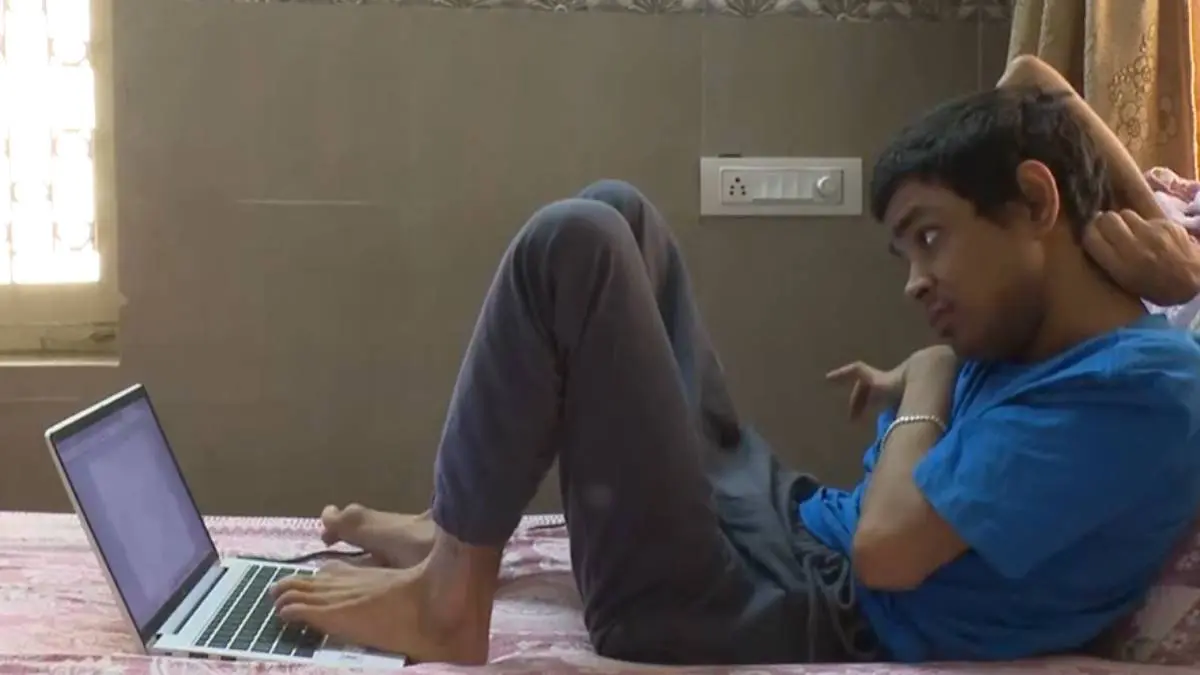 from-cerebral-palsy-to-tcs-the-unstoppable-journey-of-ahmedabad-parth-raval-who-writes-his-future-with-his-toes