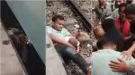 Brave Father Story: કાળ પણ થંભી ગયો પિતાના સાહસ સામે! રેલવે ટ્રેક પર બાળક માટે ઢાલ બન્યા પિતા; મોત ઉપરથી પસાર થયું પણ વાળ વાંકો ન થયો, જુઓ VIDEO