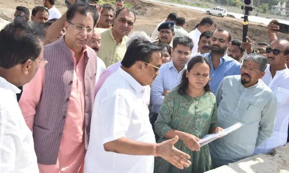 cr-patil-inspects-purna-tidal-regulator-dam-project-in-navsari-during-pragatipath-yatra