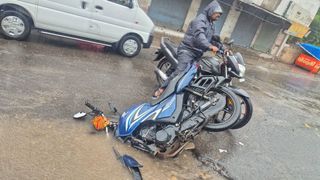 Junagadh Rain: Couple riding bike falls in waterlogged ditch, husband's head explodes, chilling CCTV footage emerges
