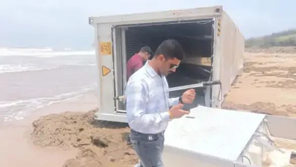 veravalnavaparabeach-empty-shipping-containerwashesashoregir-somnath-news