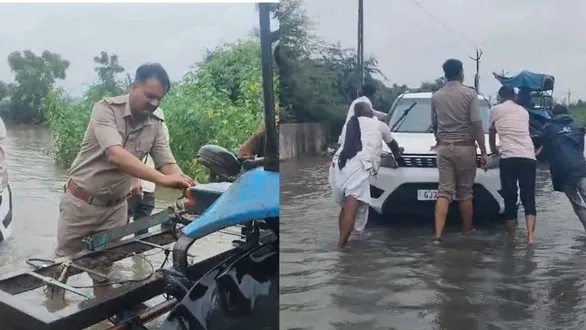 mahisagar-police-on-alert-amid-heavy-rain-help-stranded-vehicles