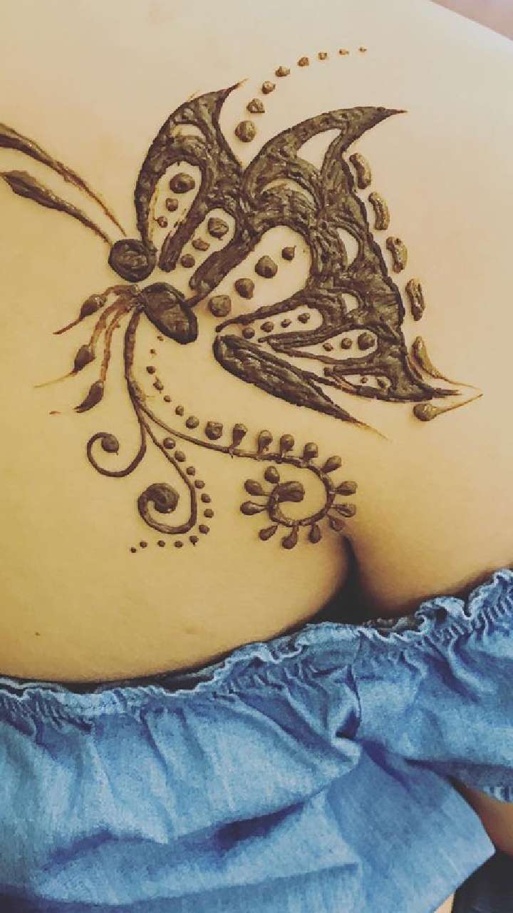 Unique Mehndi Designs - Butterfly tatto on leg | Facebook